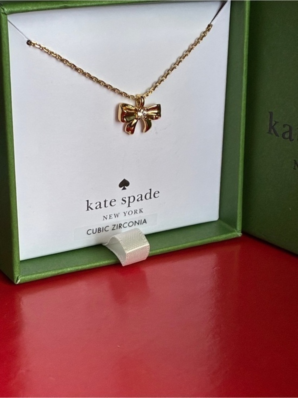 Kate Spade Gold Bow Pendant Necklace with Cubic Zirconia